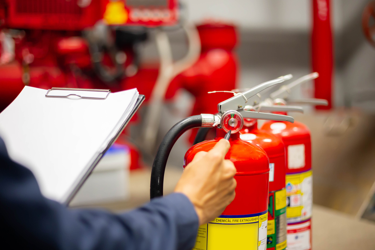 Nashville business owners check their fire extinguishers to ensure commercial fire safety and support fire damage recovery.